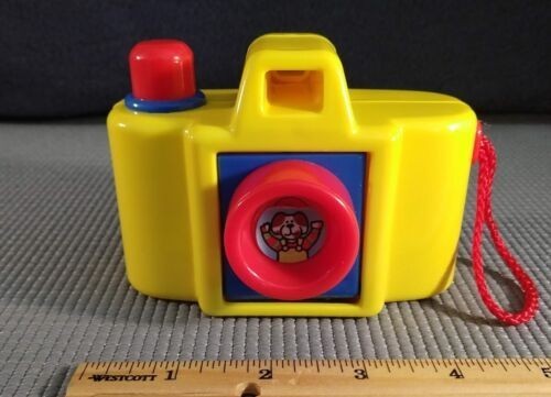 vintage-1980s-lot-of-2-toys-yellow-clown-camera-and-yellow-blue-rotary-phone-big-1
