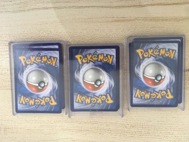 pokemon-playing-cards-never-used-90-aed-for-all-three-packs-big-0