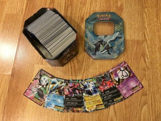 Pokémon Cards + Tin Container